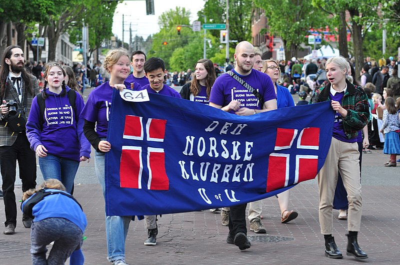 Image of University of Washington's Norwegian Club marching in the Norwegian Constitution Day Parade in Seattle. 